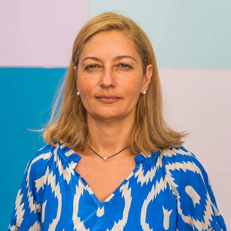 Lucia E.